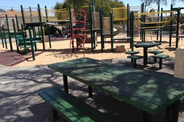 Metal and Plastic Play Structure with Sand Flooring