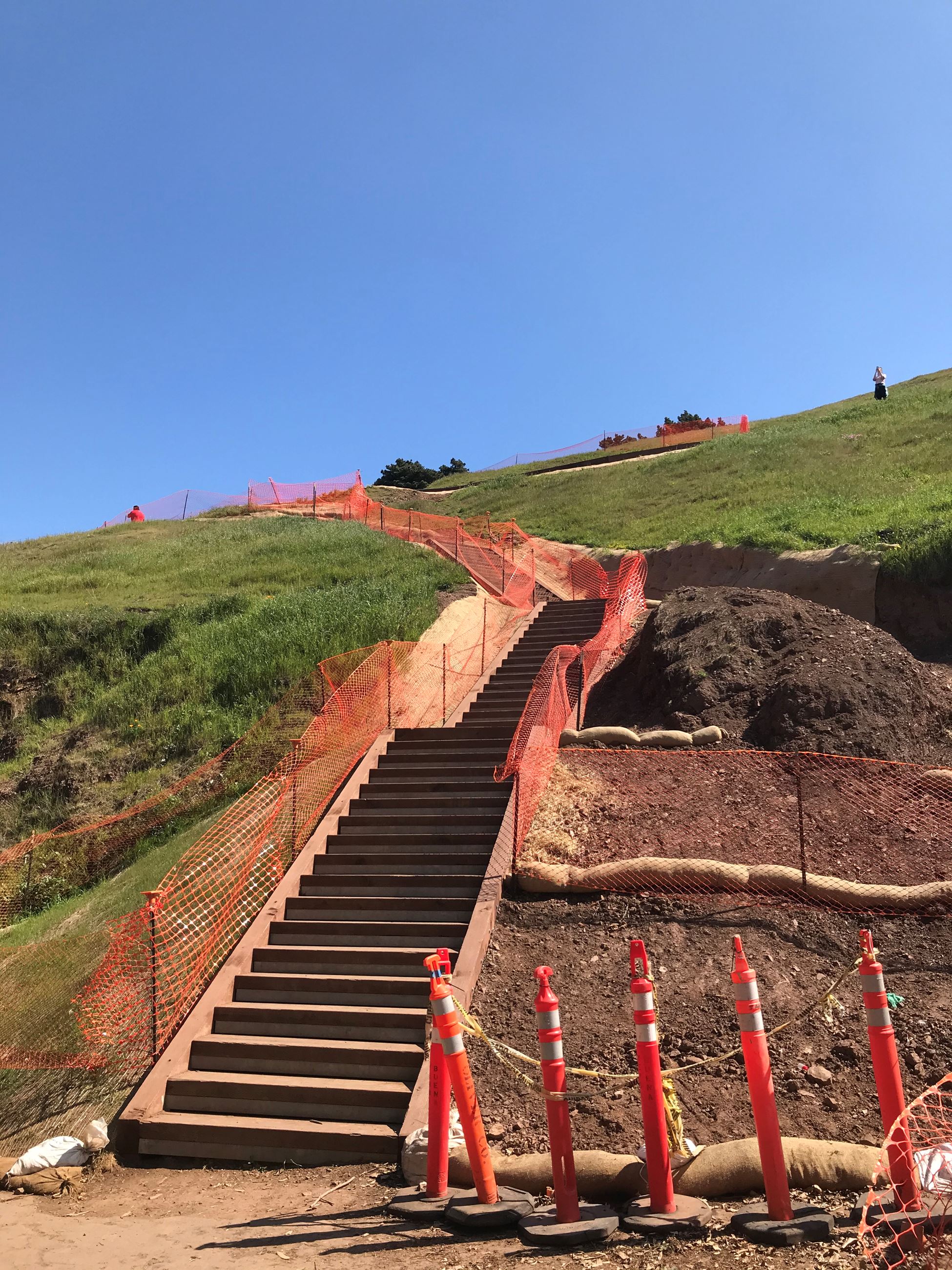 Bernal Heights trial under construction showing box steps with orange construction fencing on either