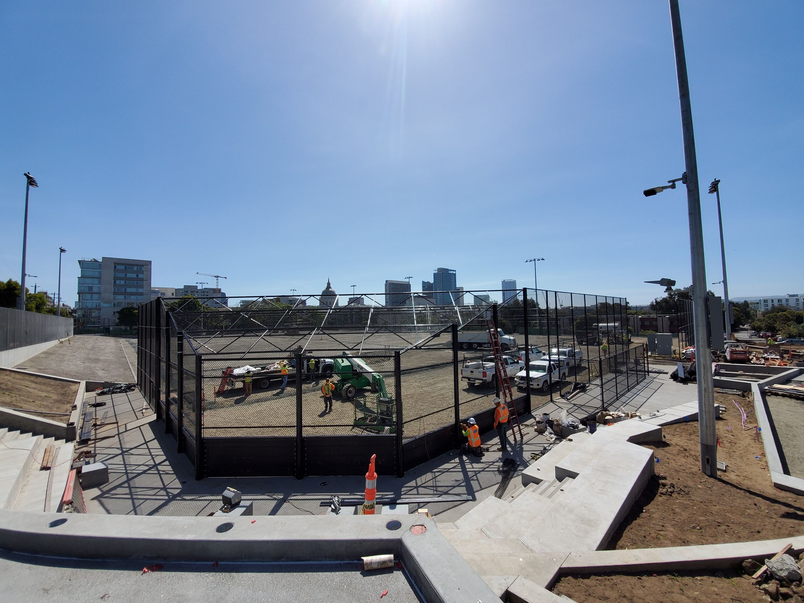 Margaret Hayward baseball backstop and bleachers in construction