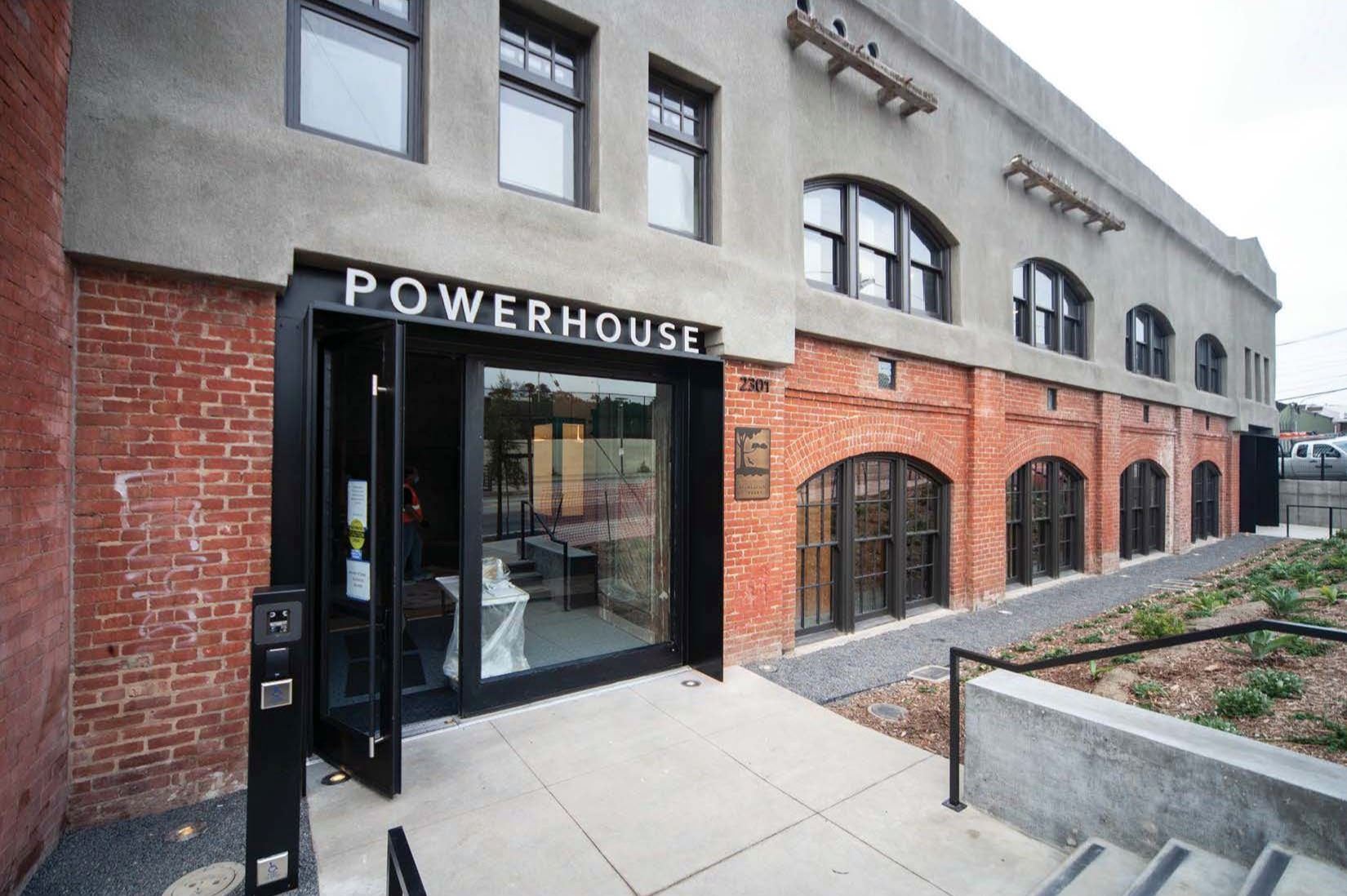 Image shows Geneva Car Barn Front elevation close up of main entrance with Powerhouse in white lette