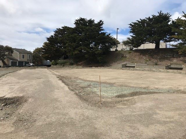 Shoreview Park future central plaza and playground area, seen here with dirt substrate material, mat