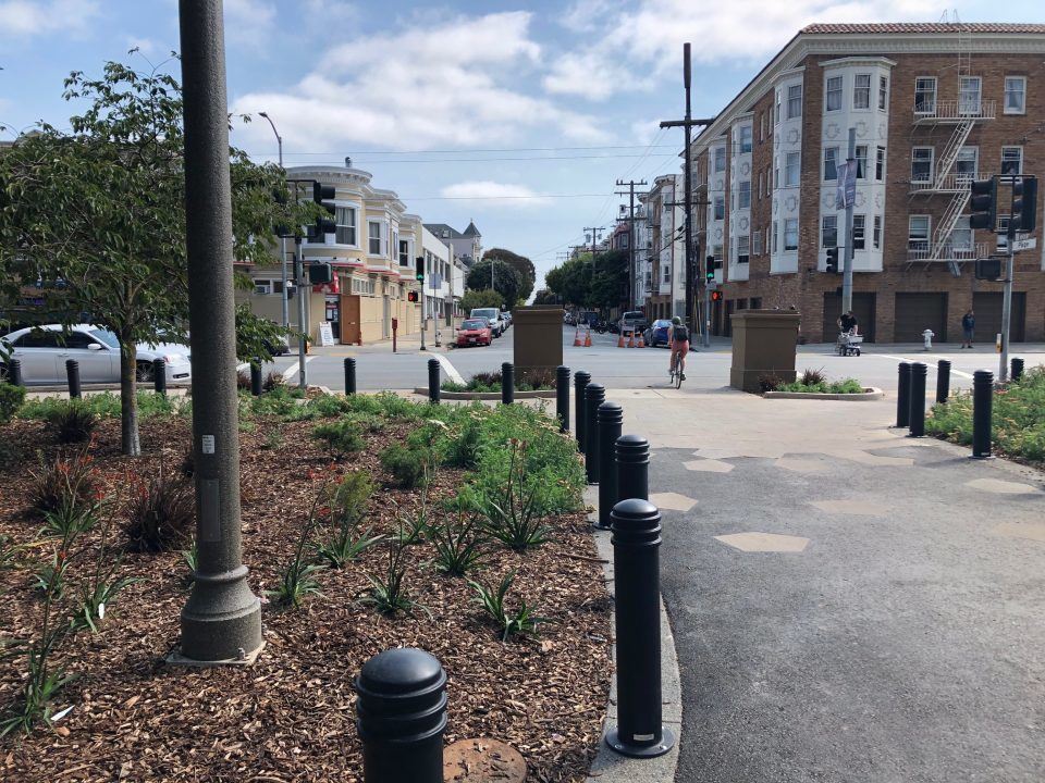 Upgraded planters, pathways and bollards facing Page Street