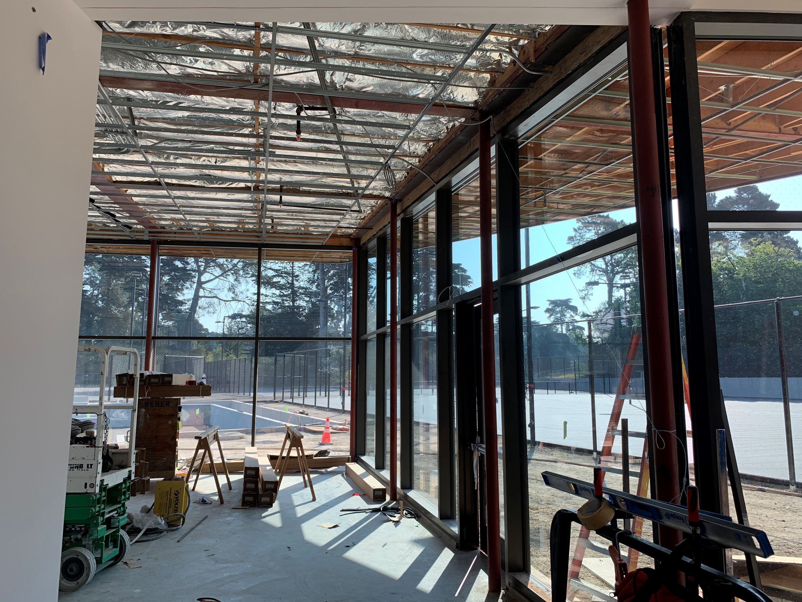 View from the Tennis Learning Center through the building to the courts outside.