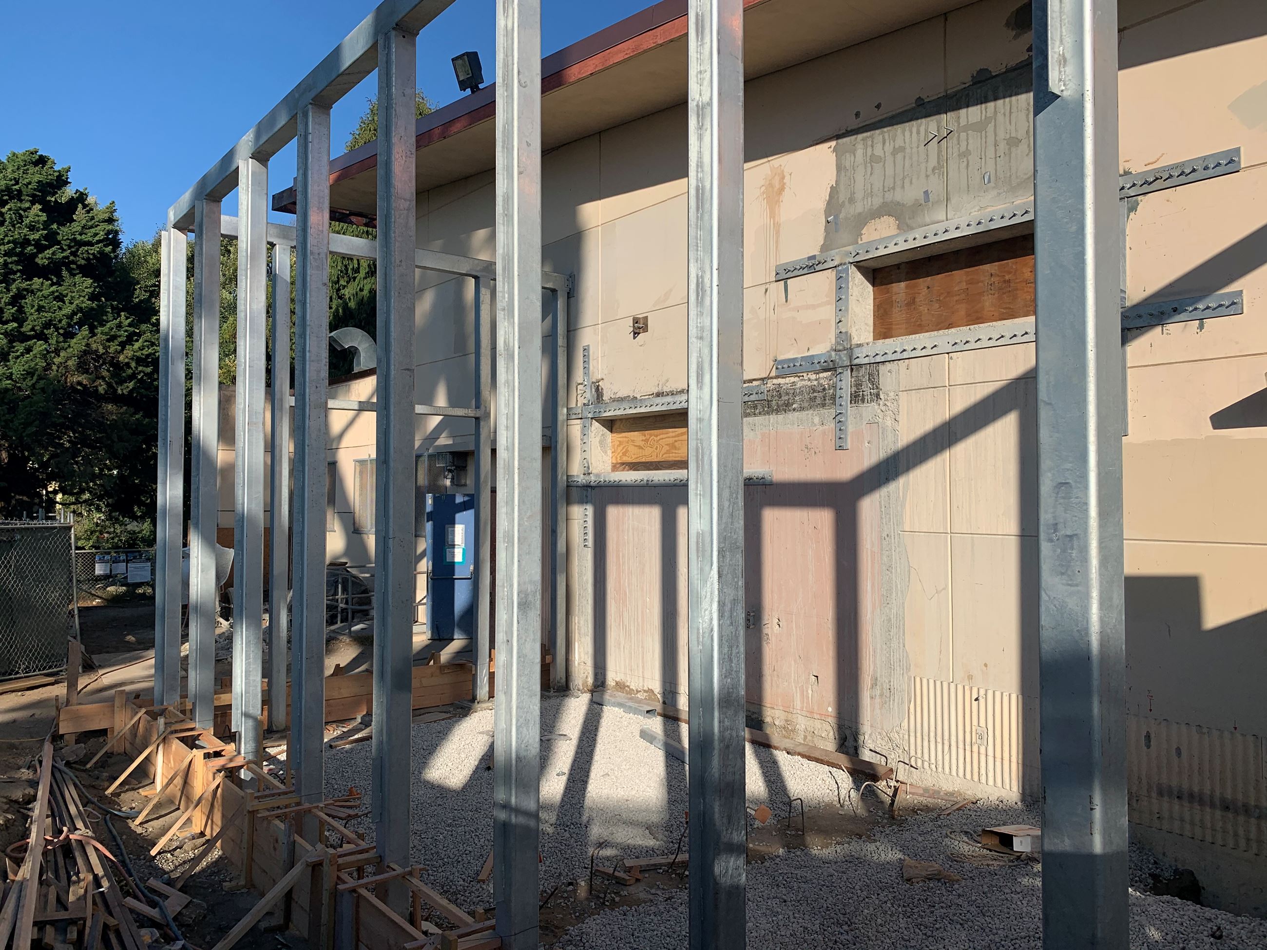 Metal wall joists outside of the existing pool building.