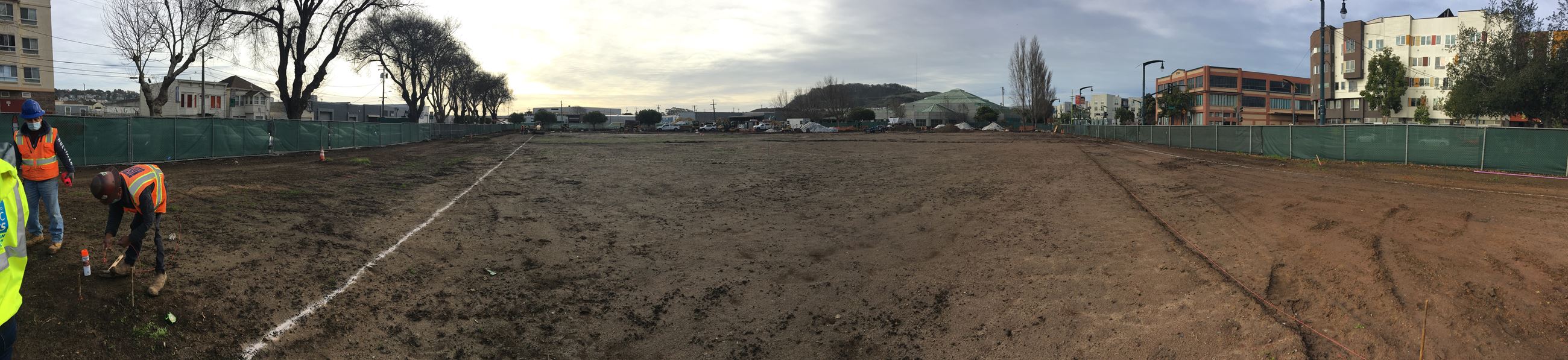 View from home plate construction workers seen here marking future fence layout.