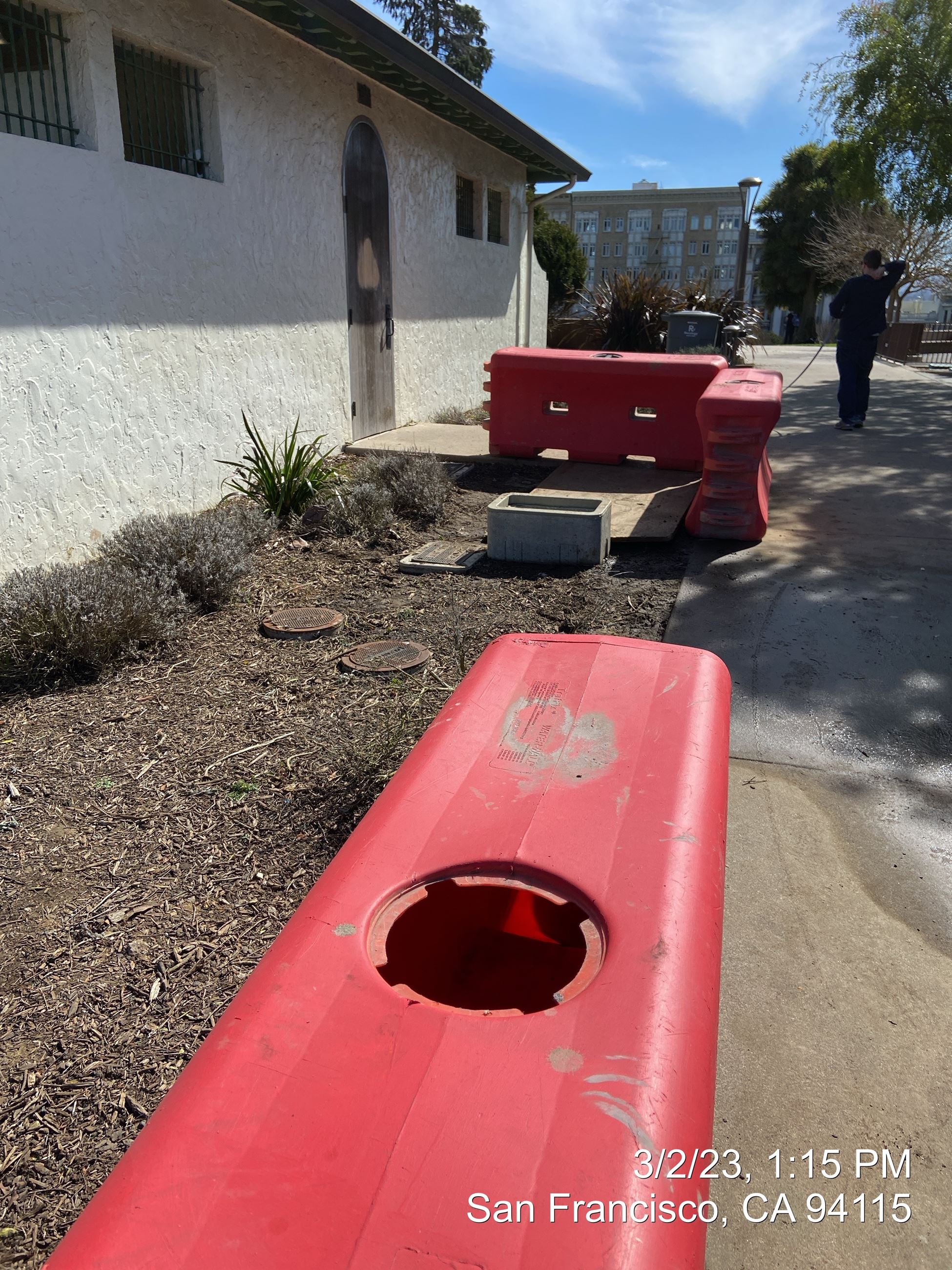 Photo of new light foundation in front of rest room at Lafayette Park