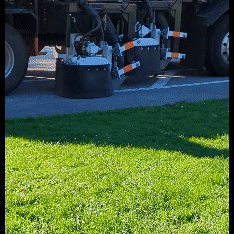 Street grinder truck removes outdated road striping November 2023