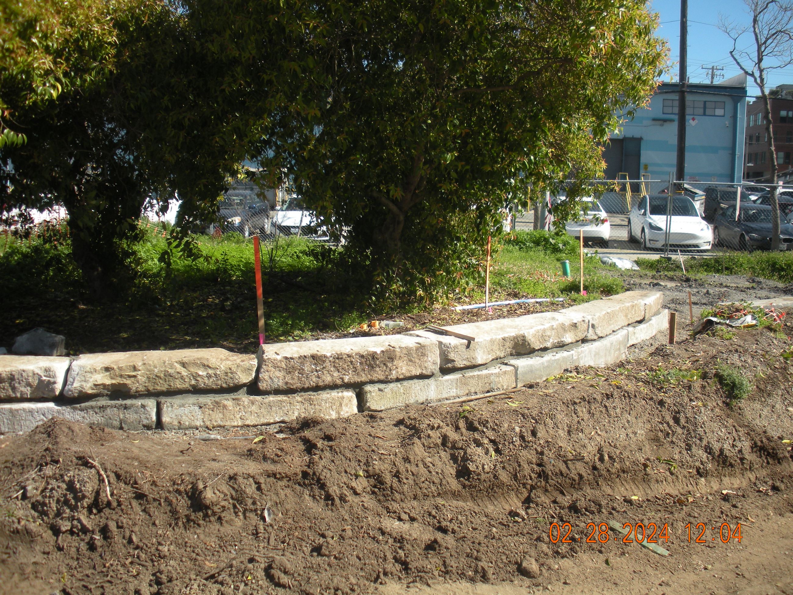 Esprit Construction - Granite wall in progress 2.28.24