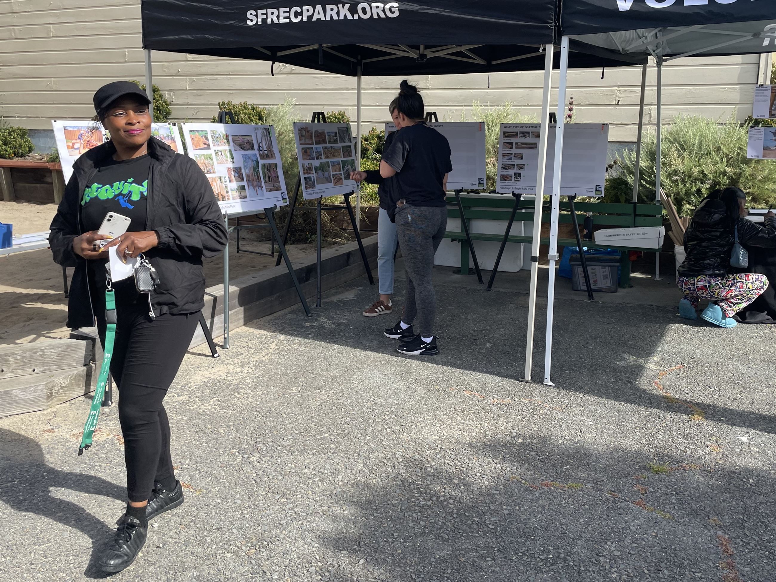 Volunteer walking from feedback table