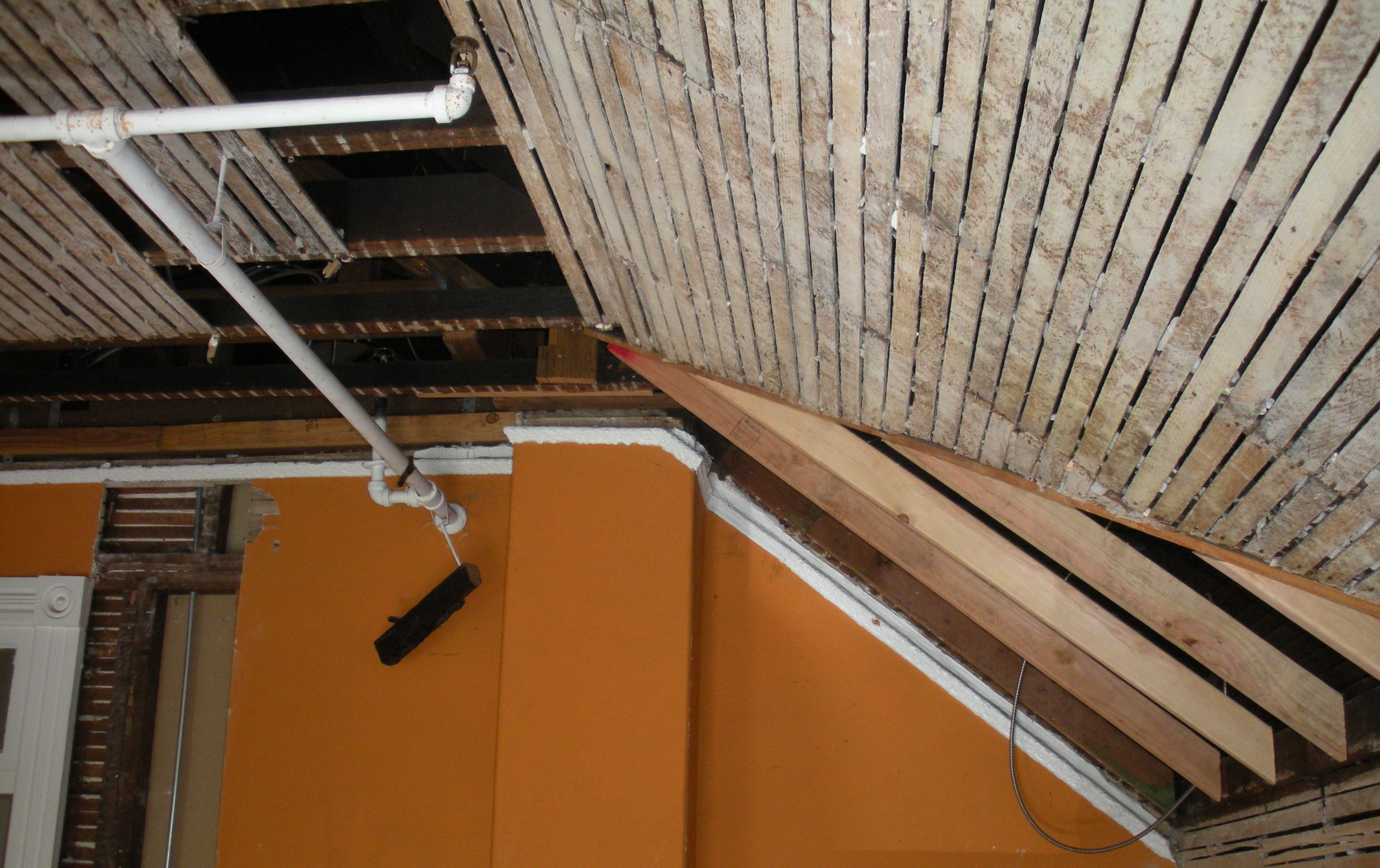 Ceiling repairs in progress on Room 203