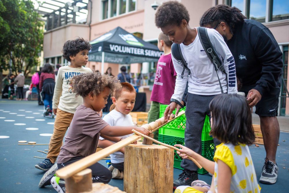 Children build with natural materials at Tenderloin Rec Center