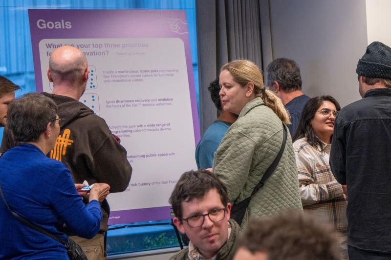 Large gathering of participants at a community meeting