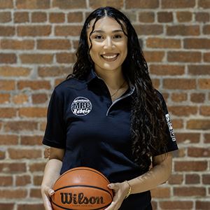 MRC Rebels coach Tyler Suarez Brown